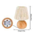 Table lamp with wooden base and beige lampshade, including dimensions on a white background