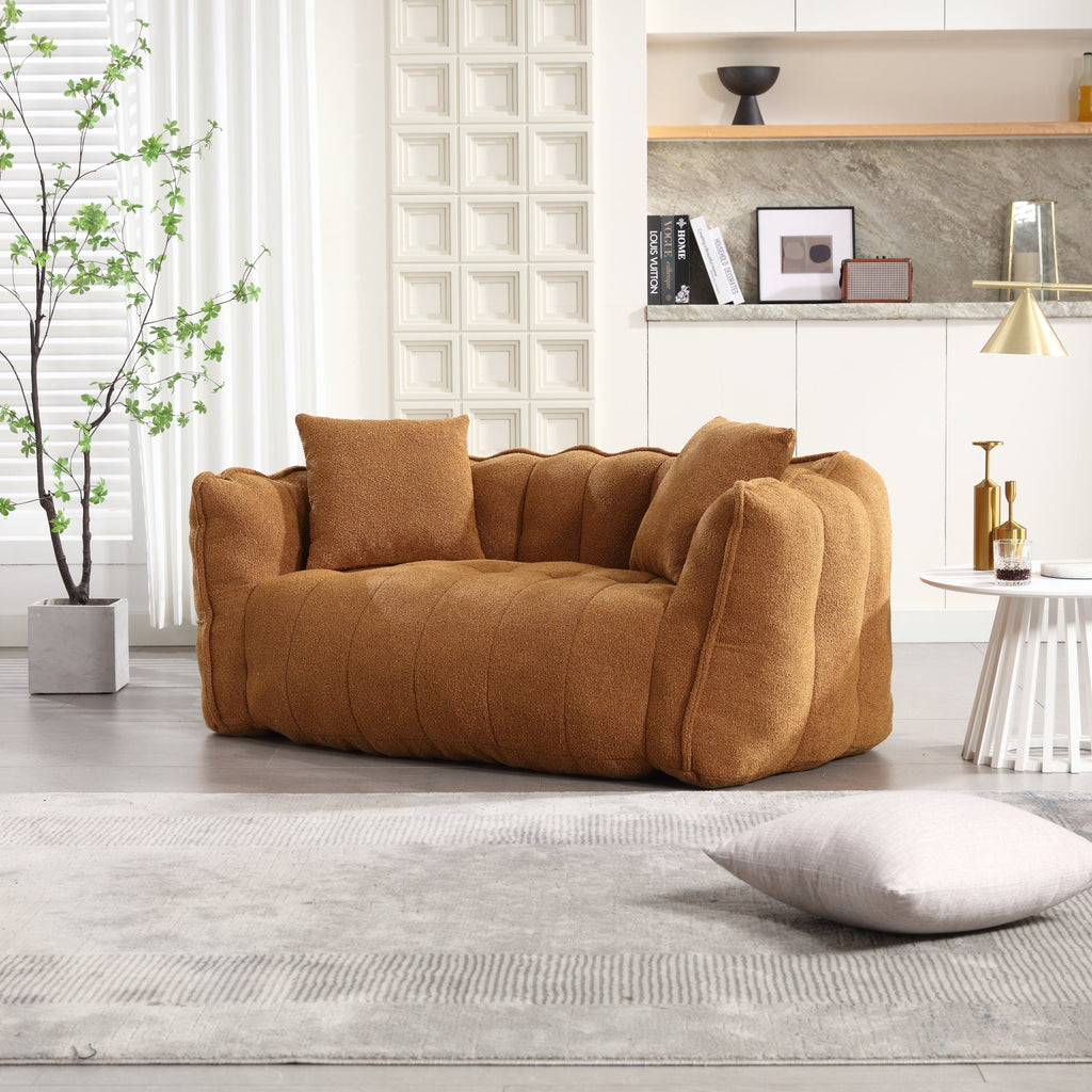 Brown sofa in a modern living room with decor elements.