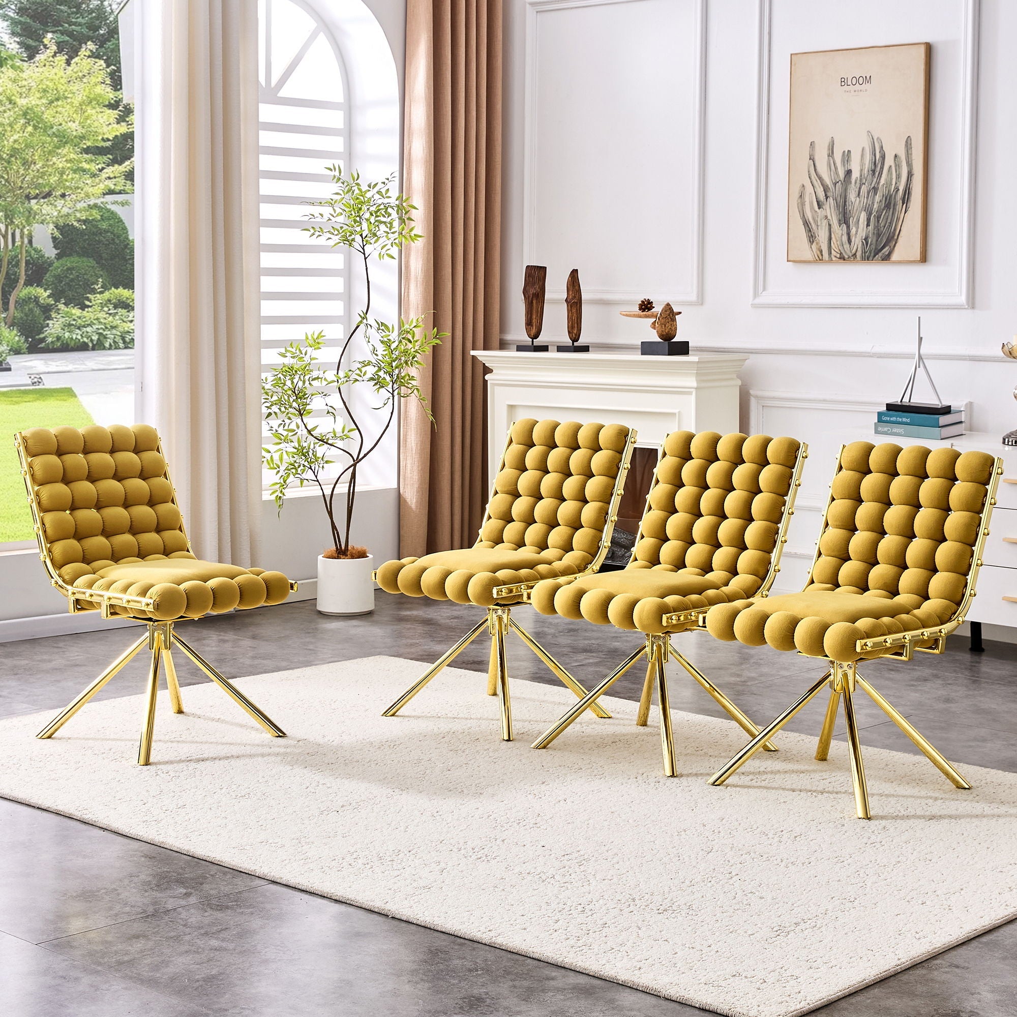 Four yellow chairs with gold legs arranged in a living room setting.
