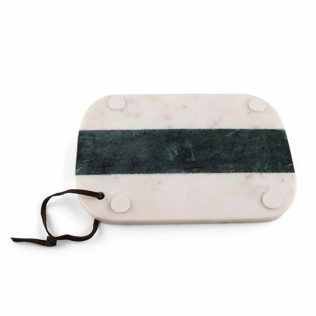 A rectangular marble serving board with rounded corners, featuring a dark green horizontal stripe across the center, four circular white pads on the underside, and a dark brown leather tie.