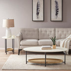Living room with a beige sofa, round coffee table, and side table.