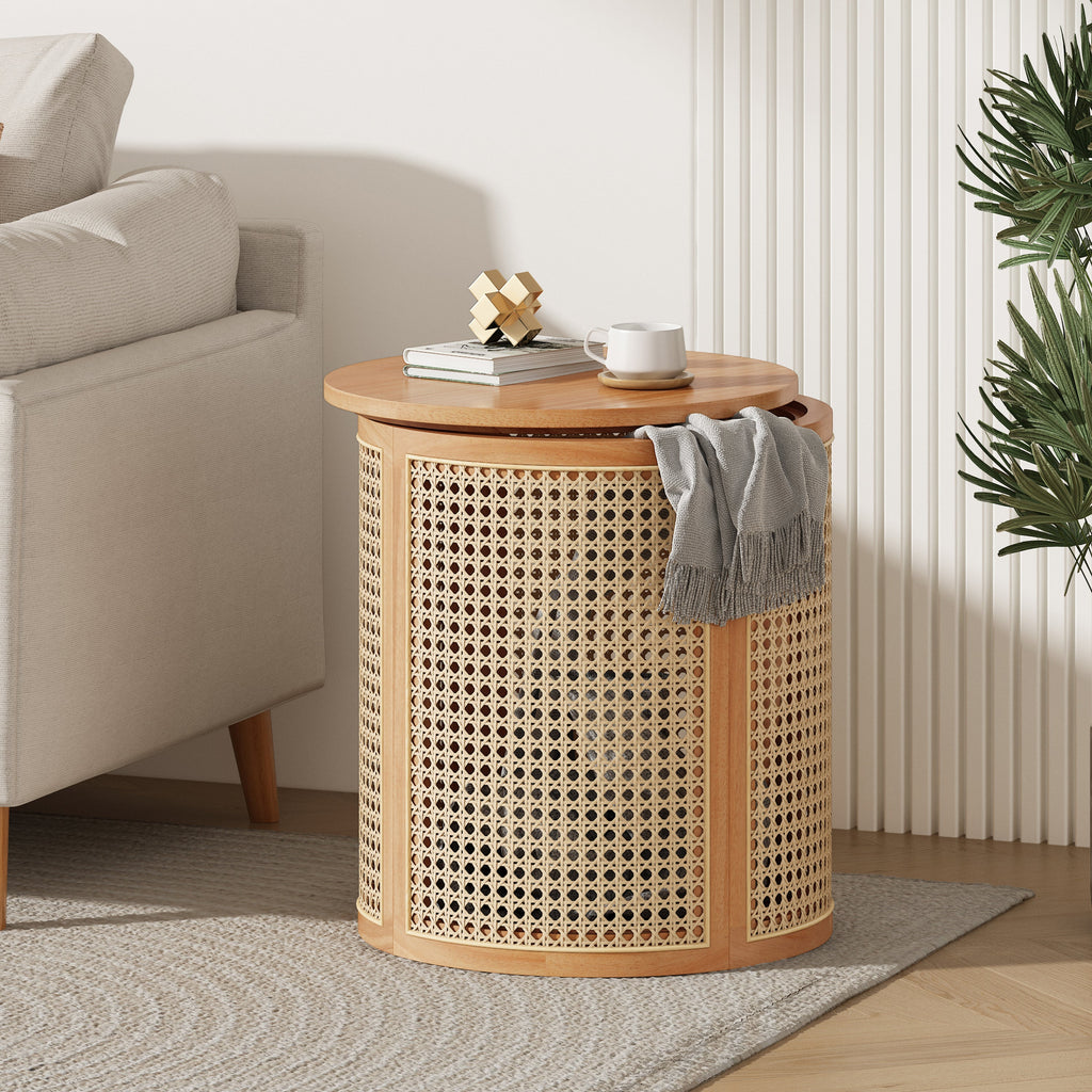 Round wicker side table with wooden top in a living room setting.
