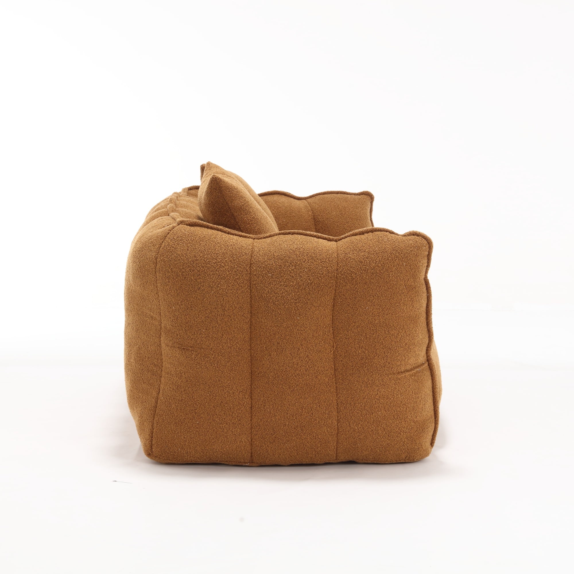 Brown fabric sofa side on a white background