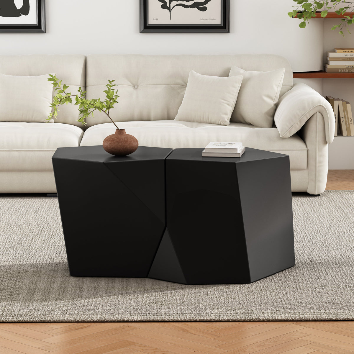 Modern living room with a black geometric coffee table and beige sofa.