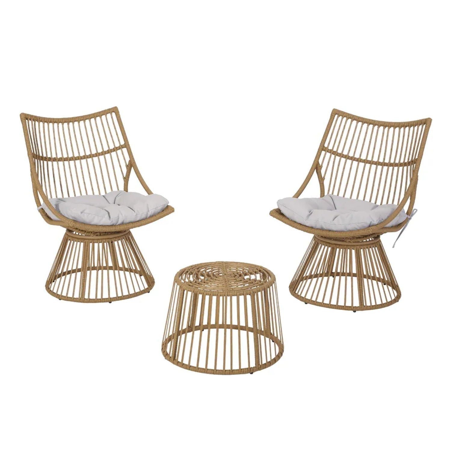 Two wicker chairs with white cushions and a matching wicker table on a white background