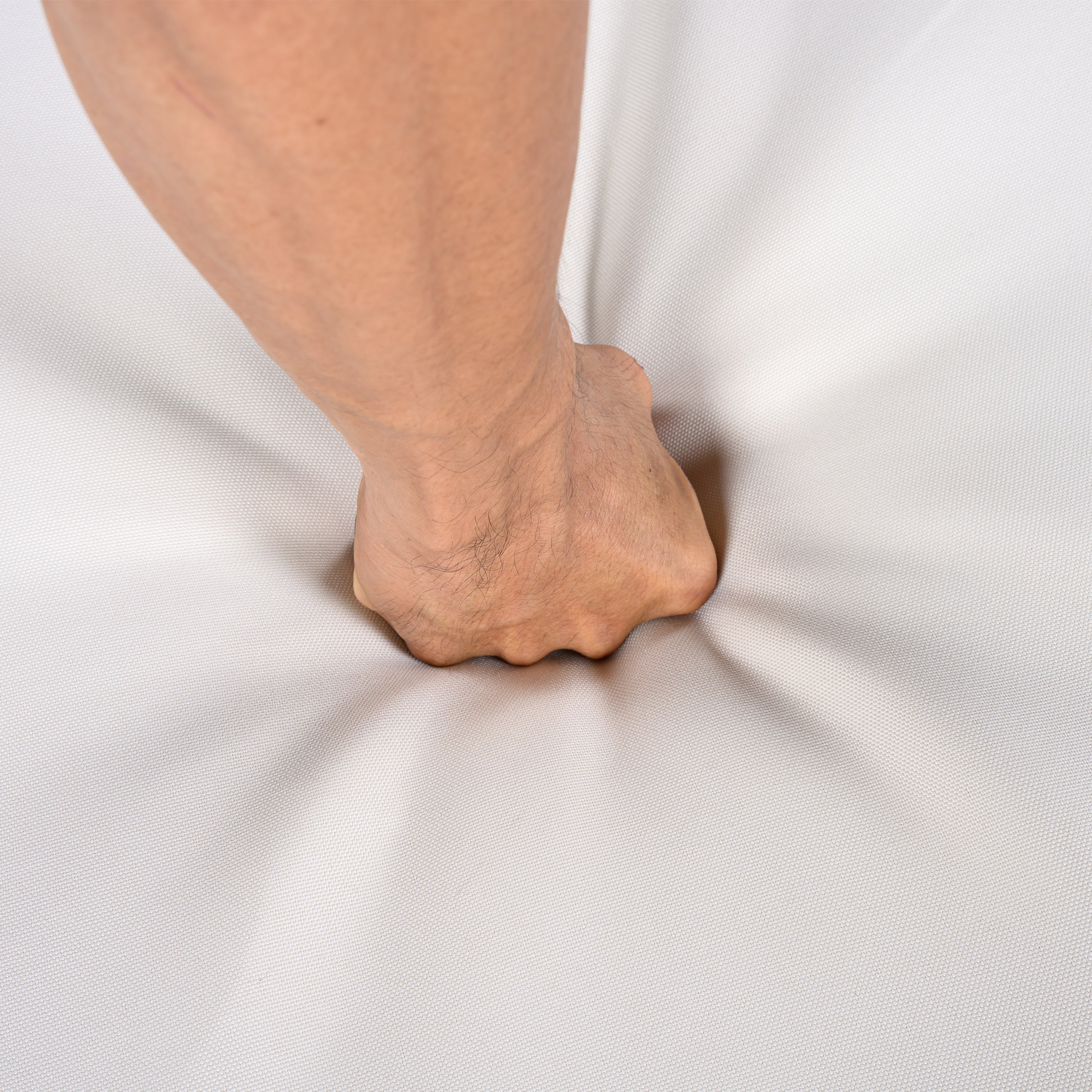 Foot stepping onto a white surface