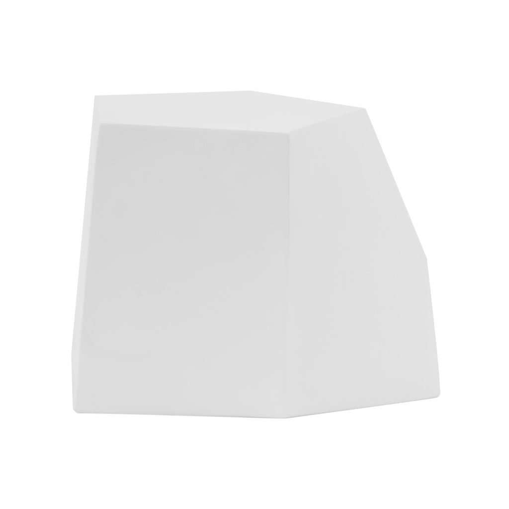 White faceted side table on a white background