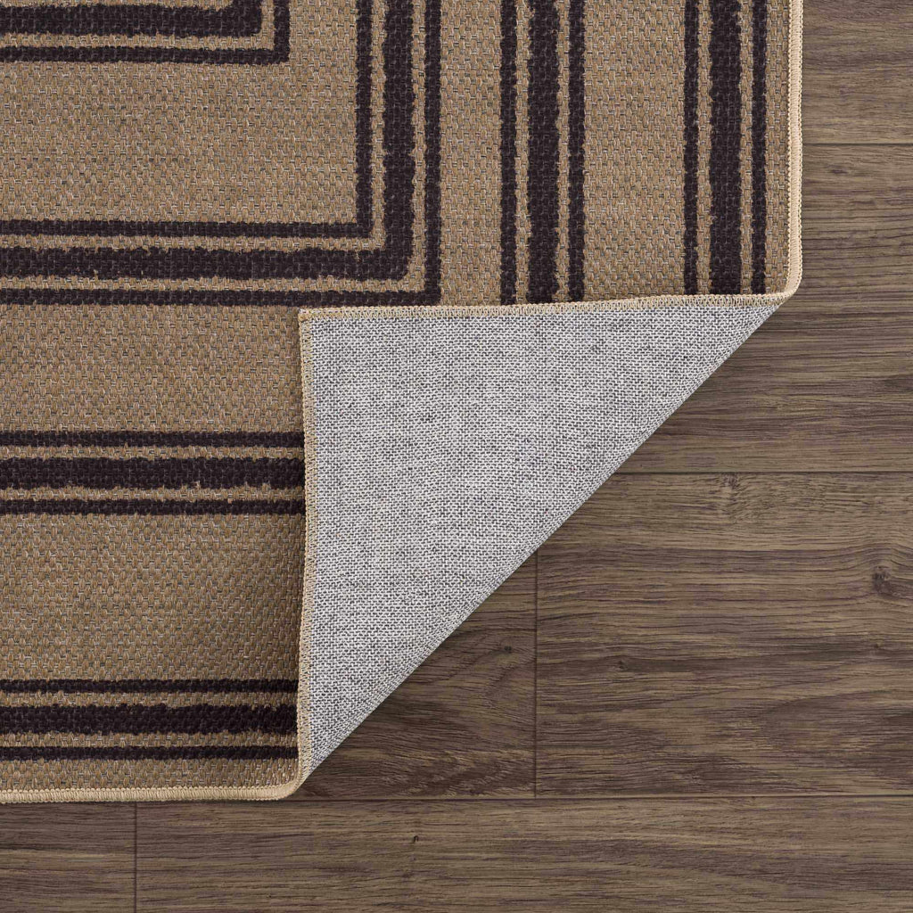 Rug with geometric pattern on a wooden floor