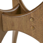 Close-up of a wooden table joint with a white background