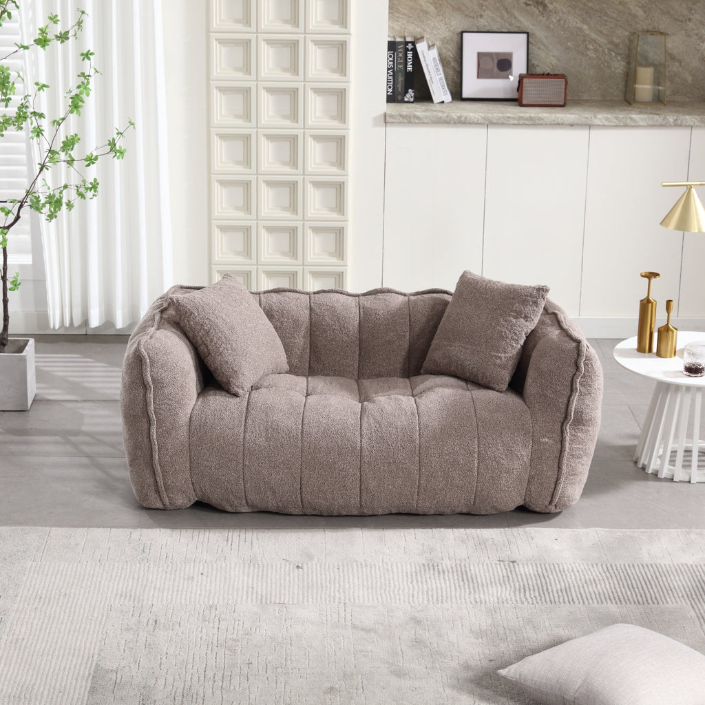 Beige sofa in a modern living room with decor elements.
