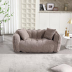 Beige sofa in a modern living room with decor elements.