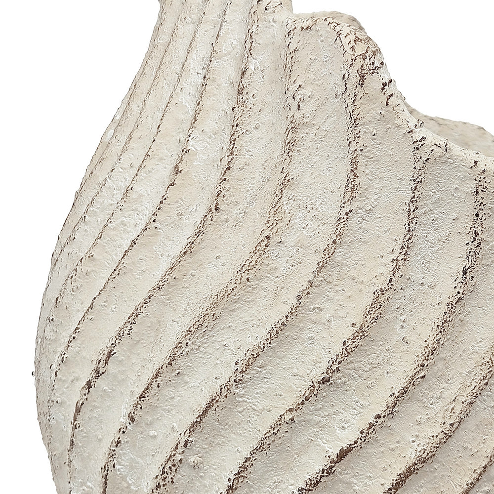Textured planter stone wall with horizontal lines on a white background