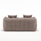 Gray sofa back with two cushions on a white background