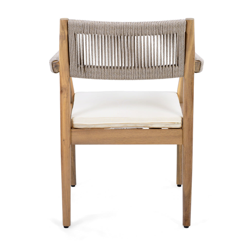 Chair with woven backrest and white cushion on a white background