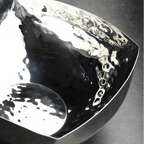 Close-up of a metallic object with reflective surface