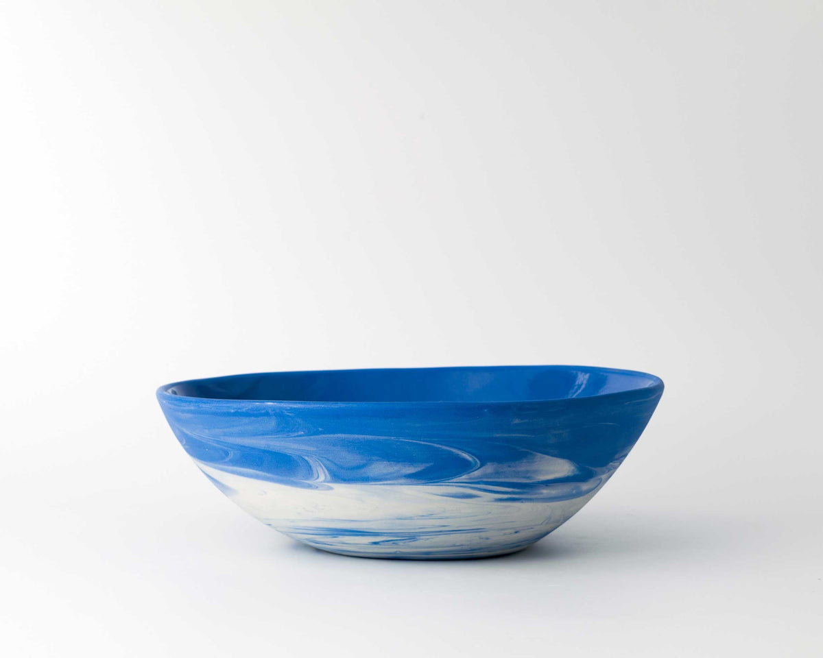 Blue and white ceramic bowl on a white background
