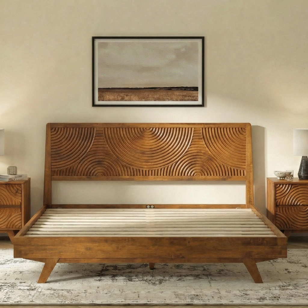Wooden bed with intricate design in a bedroom setting