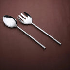 Silver spoon and fork on a brown background