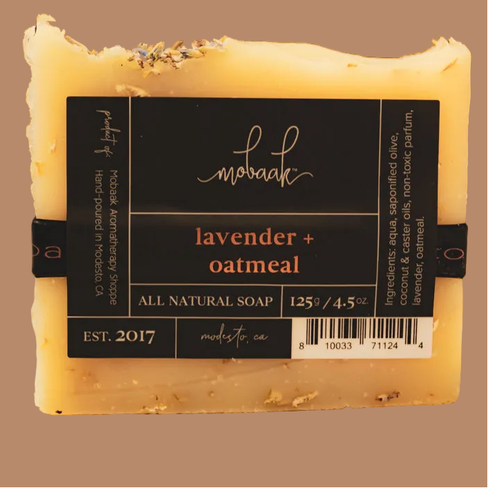 Bar of soap with a black label on a brown background