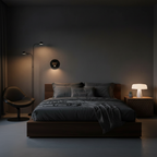 Modern bedroom with dark walls, bed, and lighting fixtures.