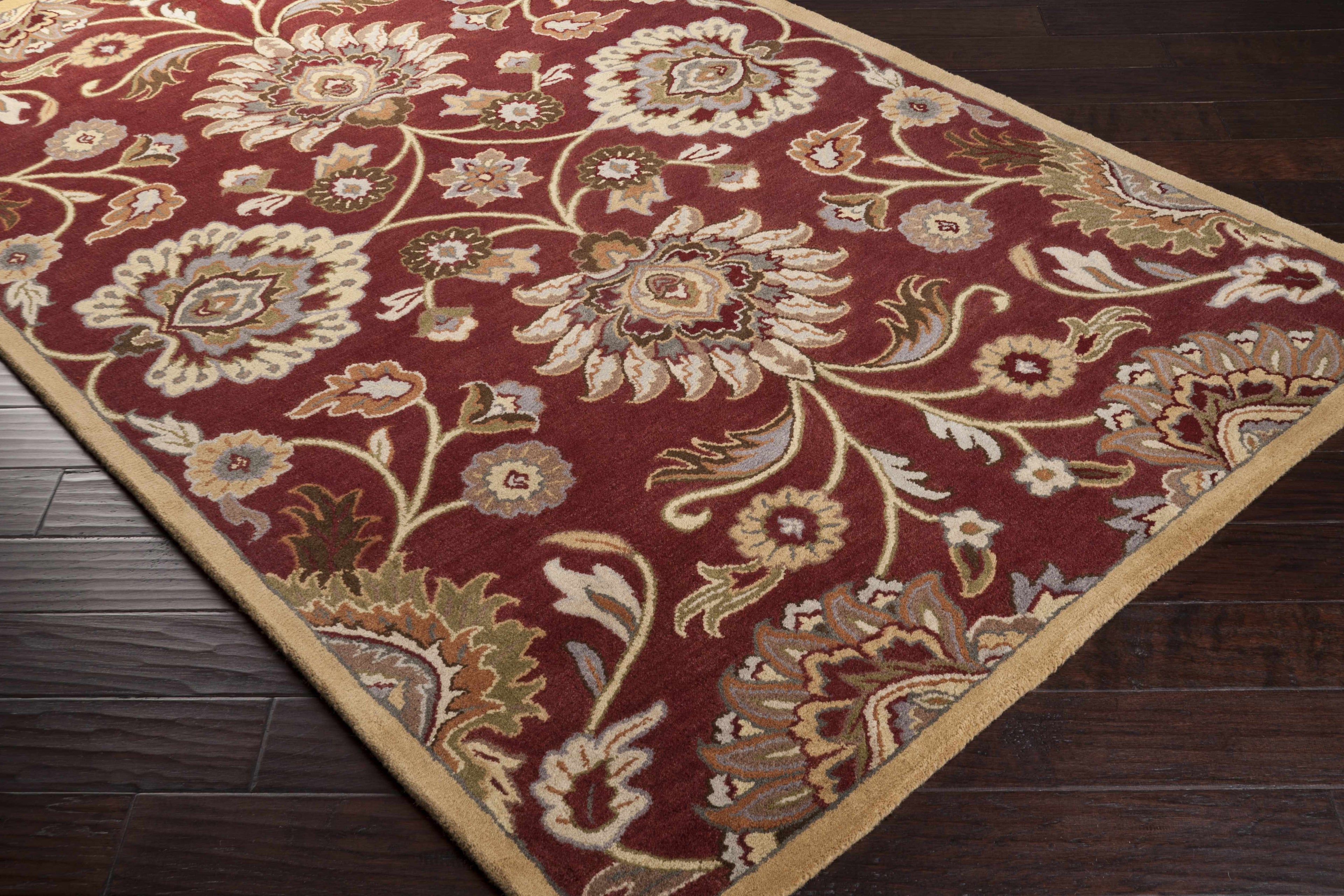 Decorative floral-patterned rug on a wooden floor