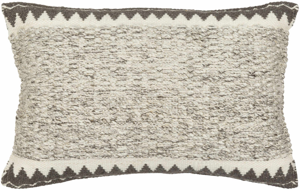 Textured rectangular pillow with a zigzag pattern on a white background