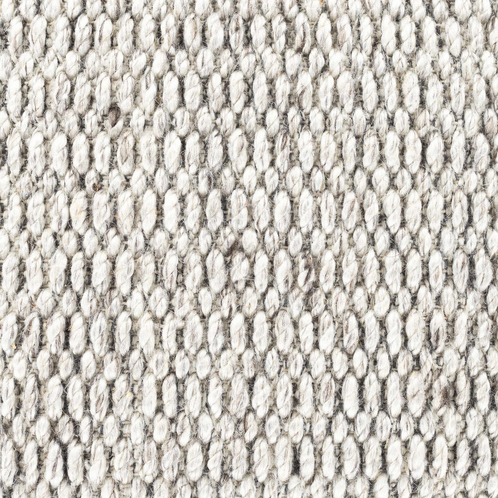 Close-up of textured beige fabric pattern