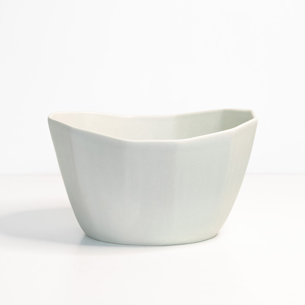 White ceramic bowl on a white background