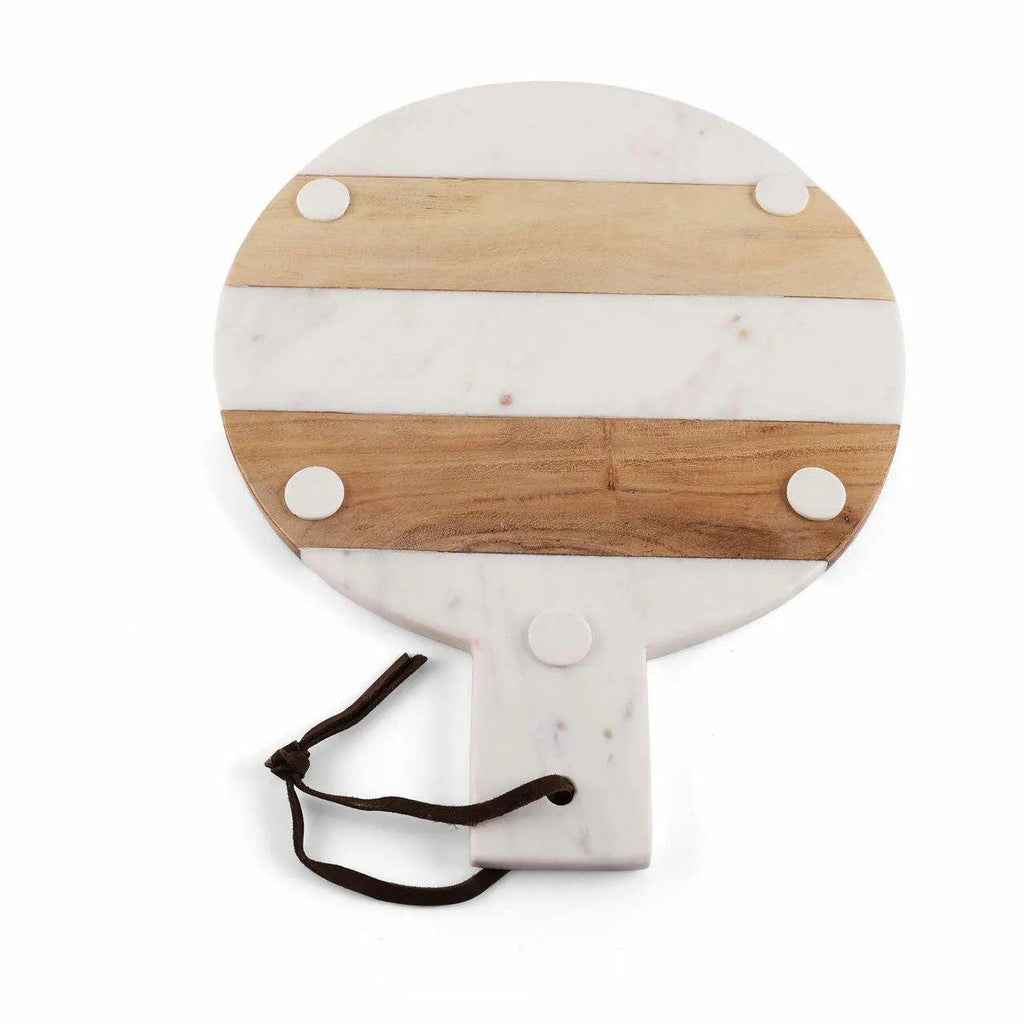 Round cutting board with marble and wood design on a white background