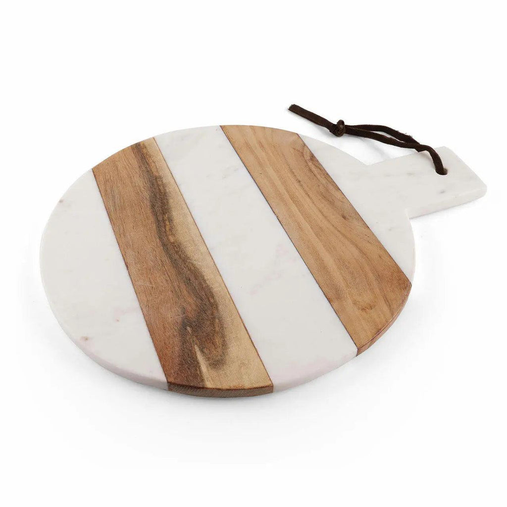 Round cutting board with wooden and white stripes on a white background