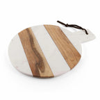 Round cutting board with wooden and white stripes on a white background