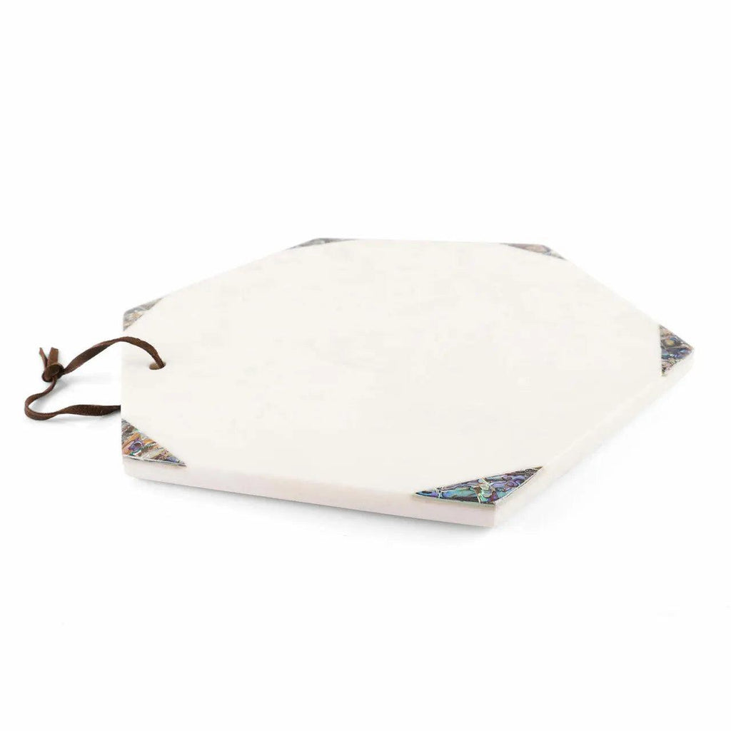 An octagonal white stone serving board with a dark brown leather loop on one side and decorative multicolor inlay at the corners, shown on a white background.