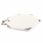 An octagonal white stone serving board with a dark brown leather loop on one side and decorative multicolor inlay at the corners, shown on a white background.
