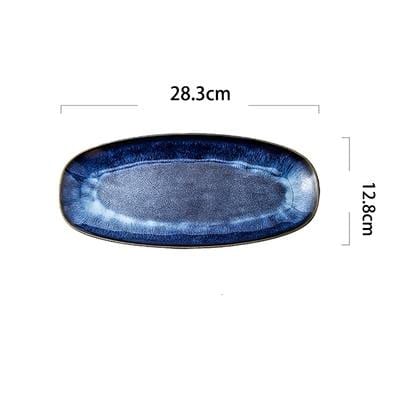 Eye of Ocean medium ceramic plate — dimension diagram showing 28.3 cm × 12.8 cm, cobalt blue glaze
