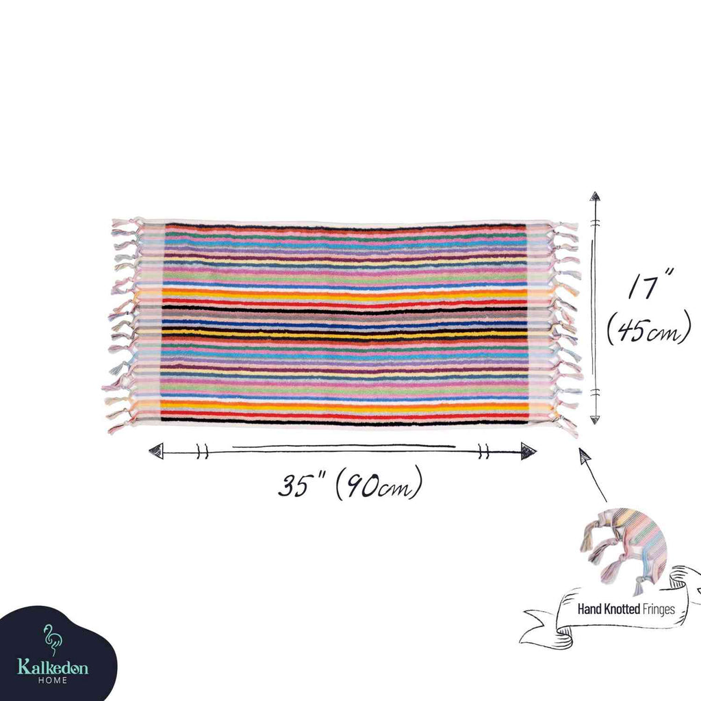 Rainbow-striped hand towel with hand-knotted fringes, 35x17 inches, colorful home decor.