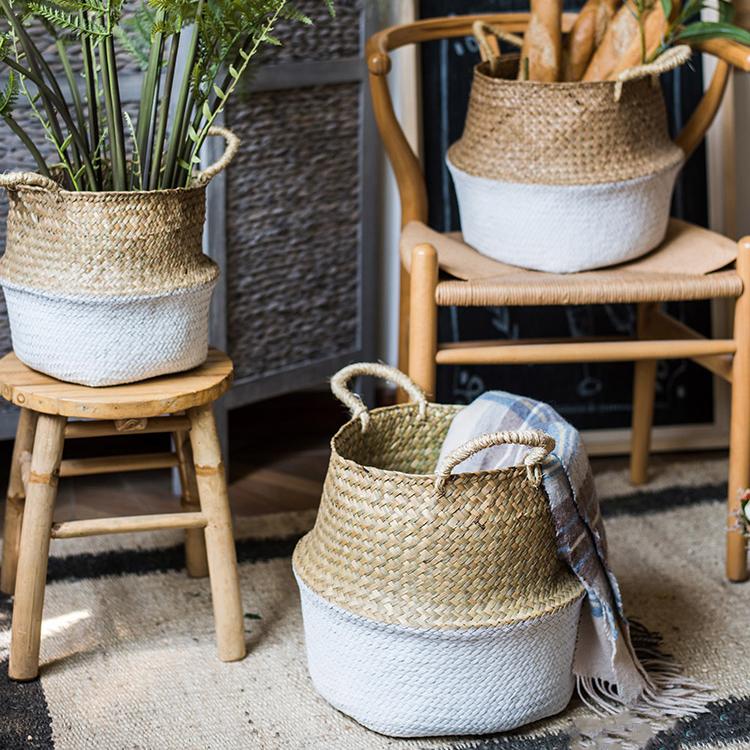 Woven baskets with plants and items on a wooden stool and chair.