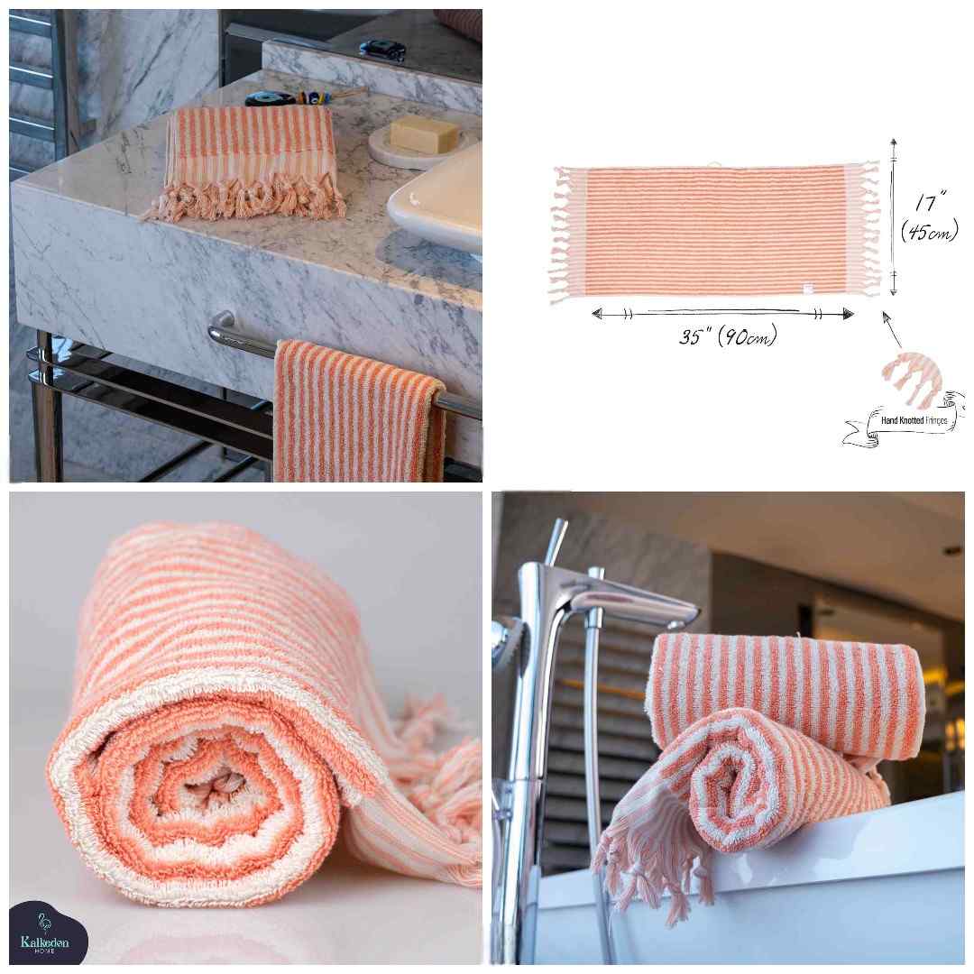 Orange and white striped hand towel with tassels, shown in modern bathroom settings